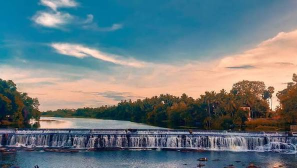 Scenic view of Kodiveri Dam in Erode with cascading water and lush greenery representing Resume Writing Services Erode by Bright Future Resume.